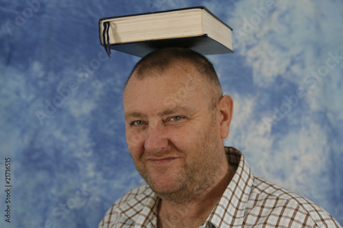 man with a head for books