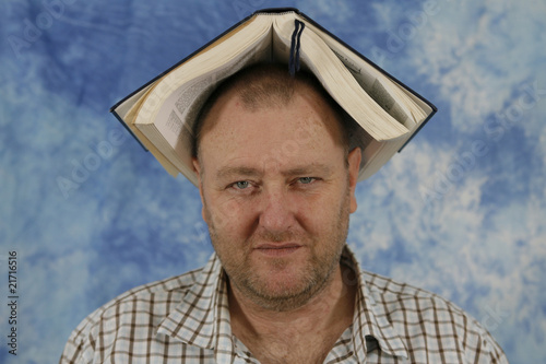 man with a head for books