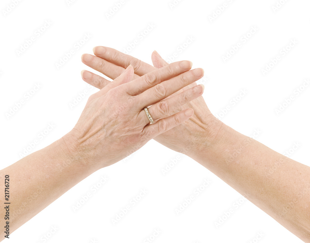 mature female hands on a white background mature female hands on a white background