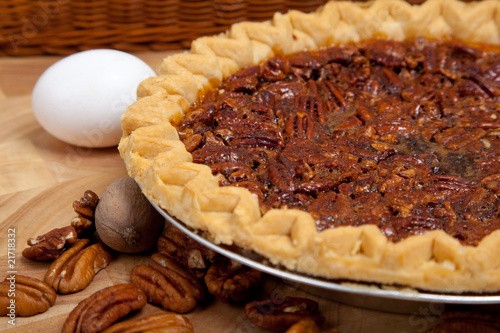 Homemade pecan pie with ingredients photo