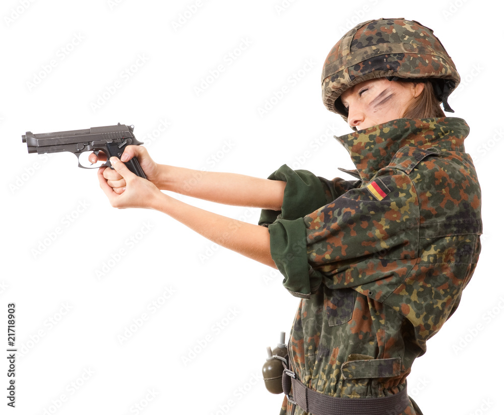 Military woman aiming Military woman aiming