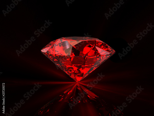 Red diamond on black background photo