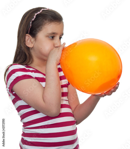 Girl blowing a balloon © kmiragaya