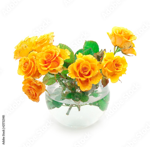 Bouquet of orange roses in a round vase