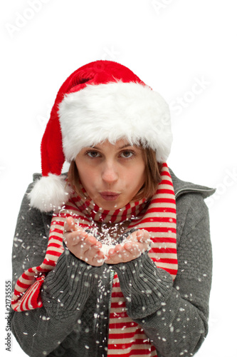 Christmas - Sweet woman blowing snow at you