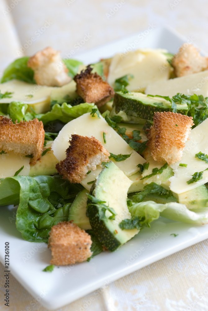 Rocket and avocado salad with parmesan and croutons Rocket and avocado salad with parmesan and croutons