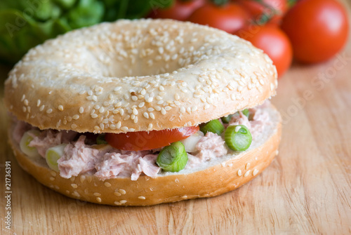 Seeded bagel with tuna filling