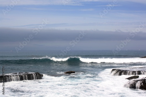 Waves splash over coast