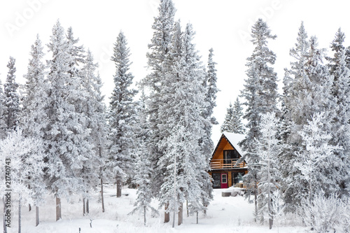 Christmas cottage in winter wonderland