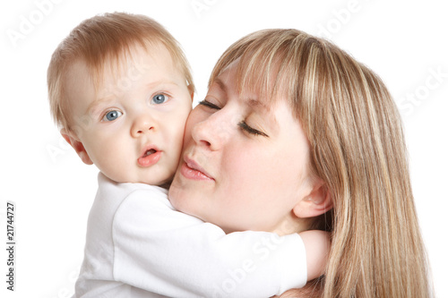 Baby embracing mom
