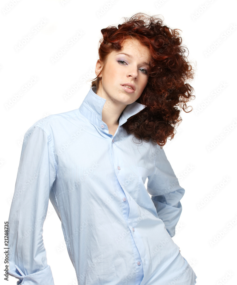 The beautiful young woman in the blue shirt The beautiful young woman in the blue shirt