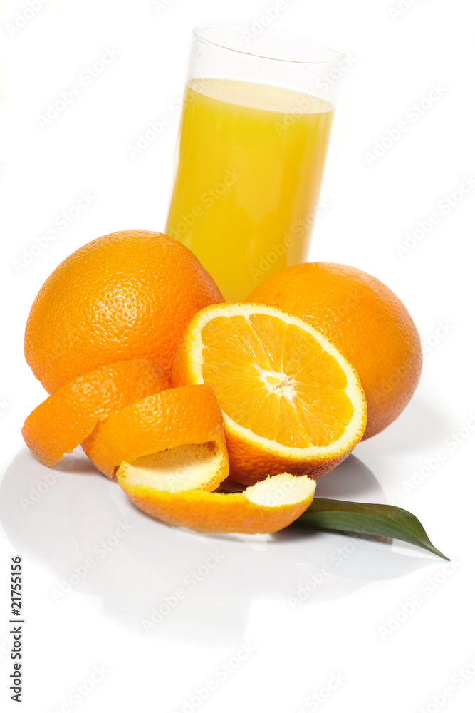 Orange juice and oranges on a white background. Orange juice and oranges on a white background.