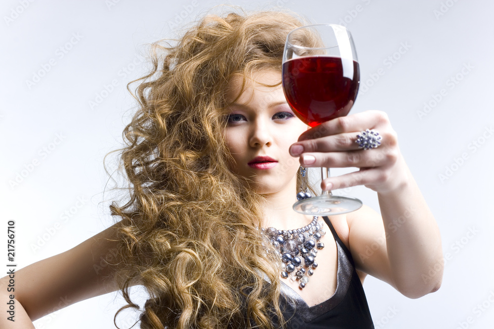 Beautiful woman with glass red wine