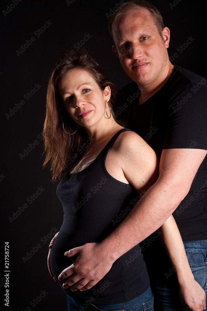 Young couple with pregnant wife Young couple with pregnant wife