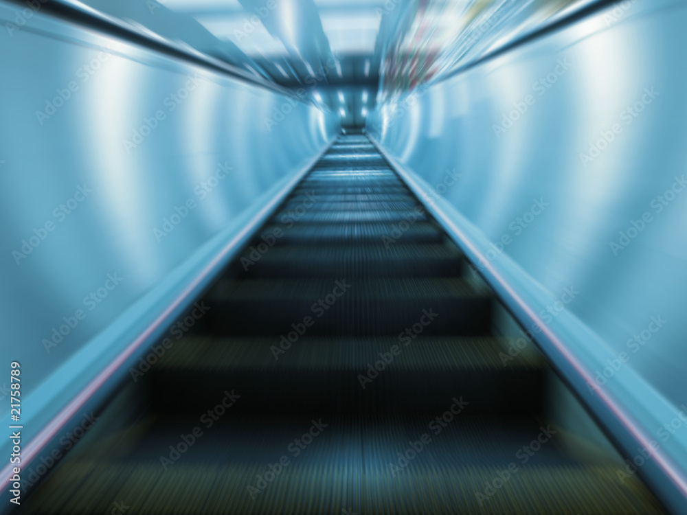 Moving escalator in subway station Moving escalator in subway station