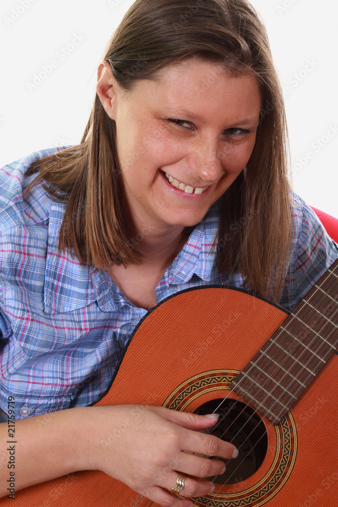 ragazza che suona la chitarra Stock Photo | Adobe Stock