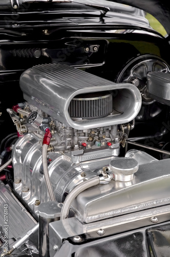 supercharger under the hood of a performance car