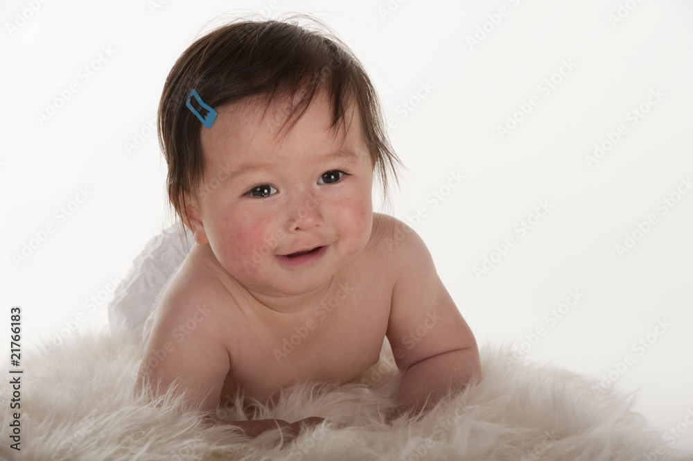 Pacific Islander baby girl learning to crawl Pacific Islander baby girl learning to crawl