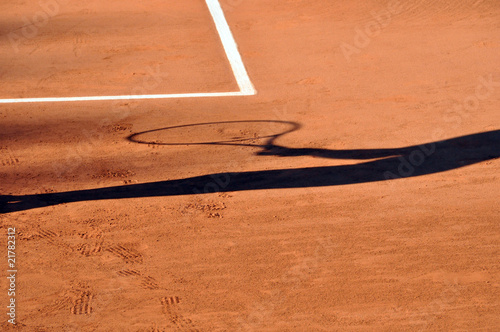 Shadow on a tennis court photo