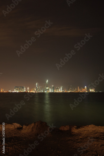 The night skyline over the persian gulf of the city of Doha