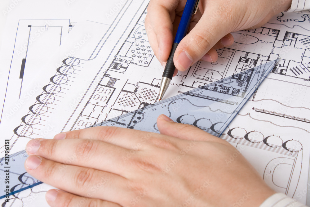 Architectural plans and blueprints in office Architectural plans and blueprints in office