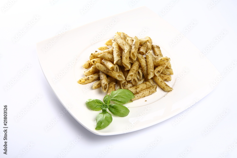 Penne with pesto decorated with basil Penne with pesto decorated with basil