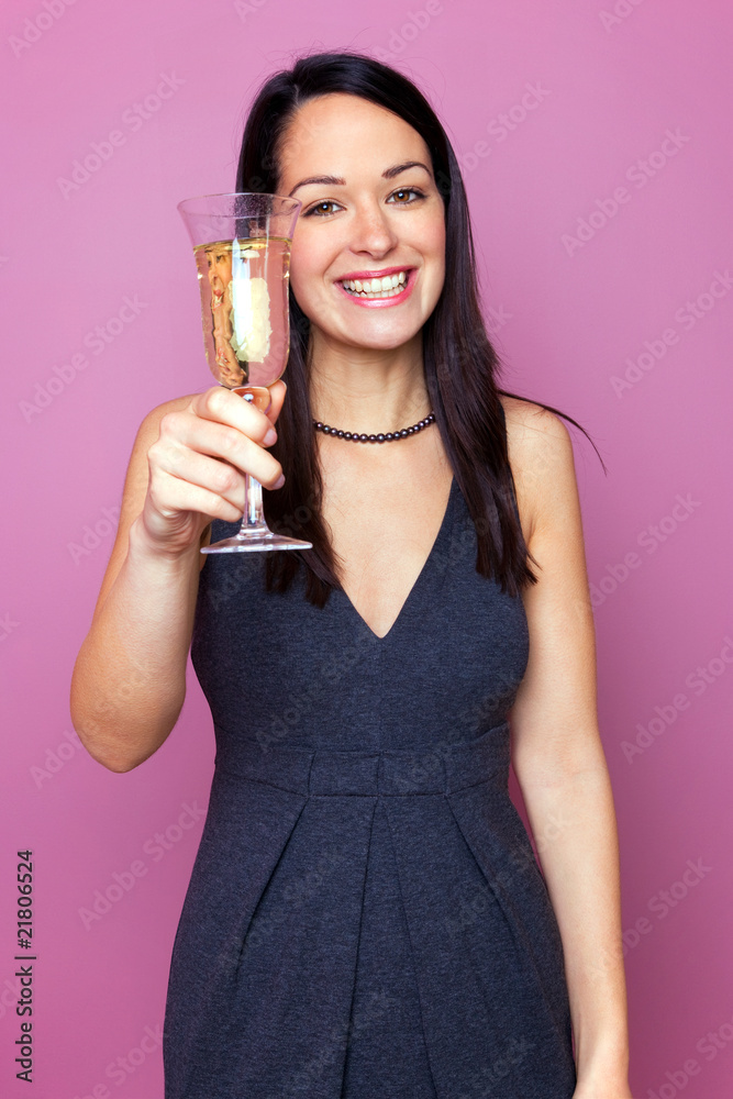 Woman raising a glass of champagne Woman raising a glass of champagne