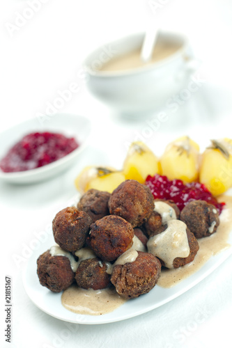 Sweedish Kottbullar meatball with brunsas sauce, boiled potatoes photo