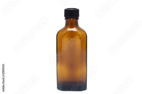 Glass bottle isolated on a white background.