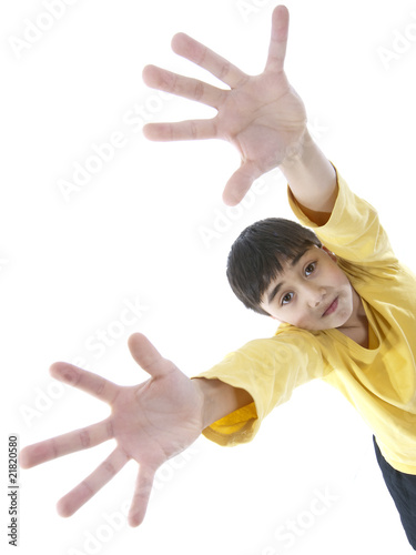 boy reaching high