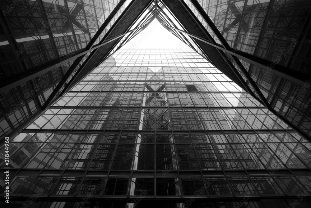 reflection in glass wall of modern skyscraper reflection in glass wall of modern skyscraper