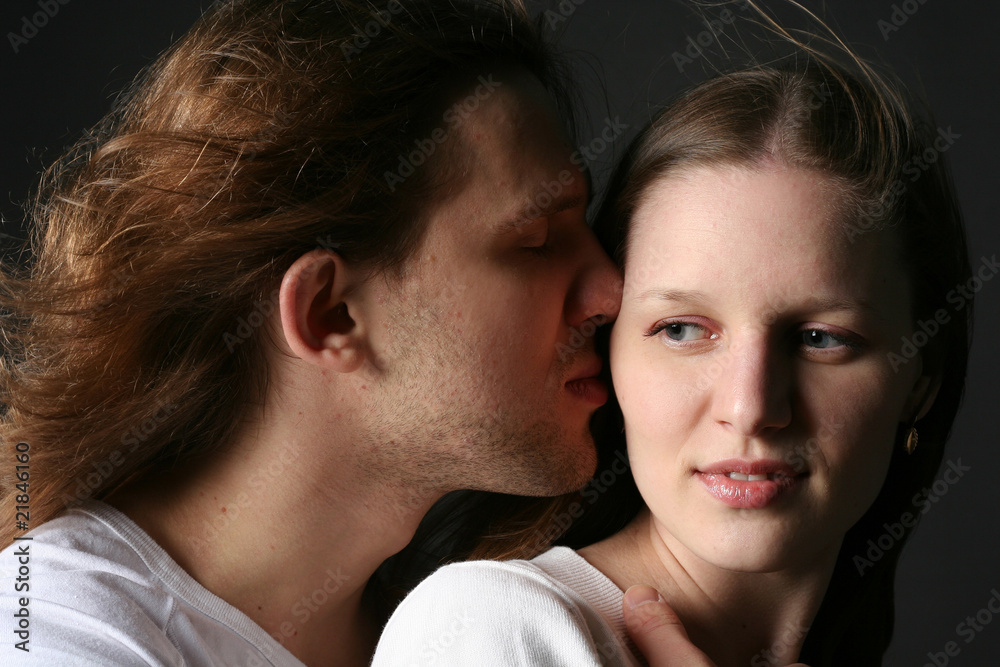 Young Man and woman isolated on black background Young Man and woman isolated on black background