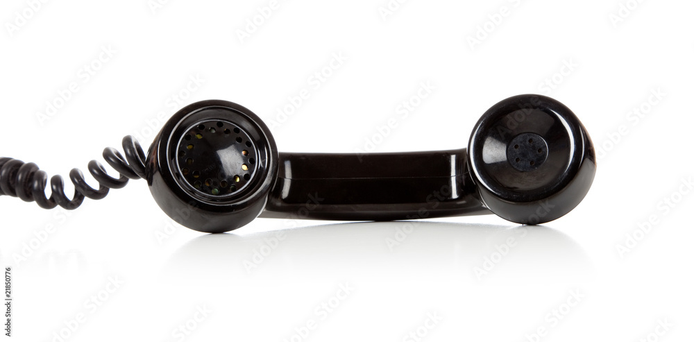 A black telephone receiver on a white background A black telephone receiver on a white background
