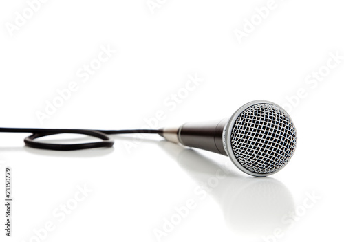 Black and silver microphone on a white background