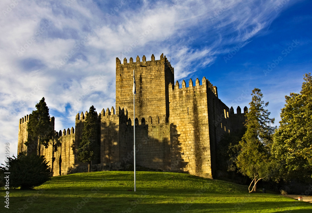 Guimaraes Castle, and surrounding park, in the north of Portugal Guimaraes Castle, and surrounding park, in the north of Portugal