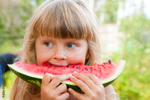Little girl with watermelon