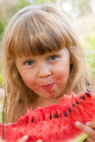 Little girl with watermelon