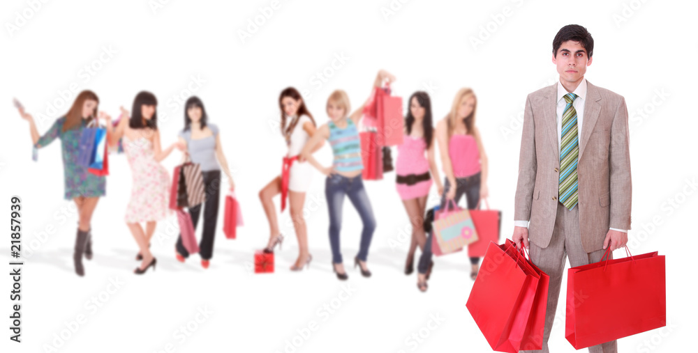 Obraz premium Shopping man with group of girls