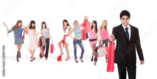 Shopping man with group of girls