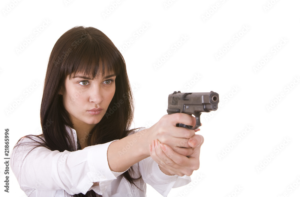 Beautiful aggressive girl with gun. Isolated. Beautiful aggressive girl with gun. Isolated.