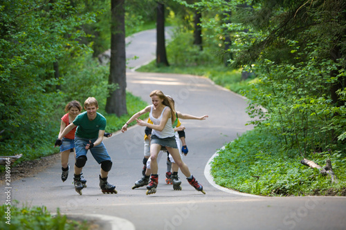 People skating at park photo