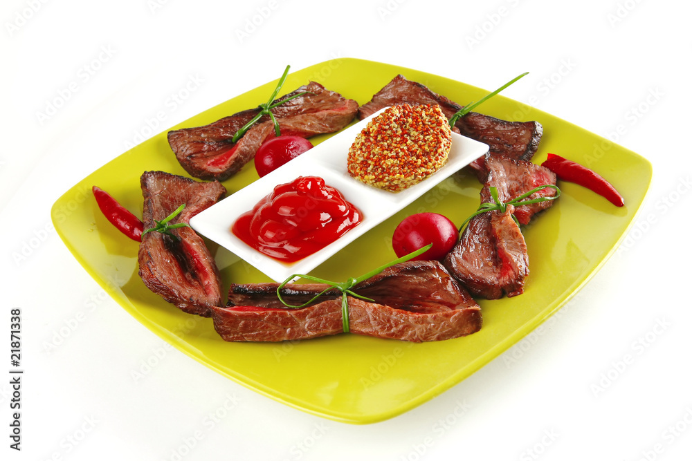 meat slices on green