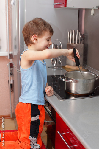 Child cooking porridge