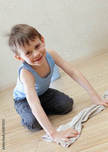 Child washing floor