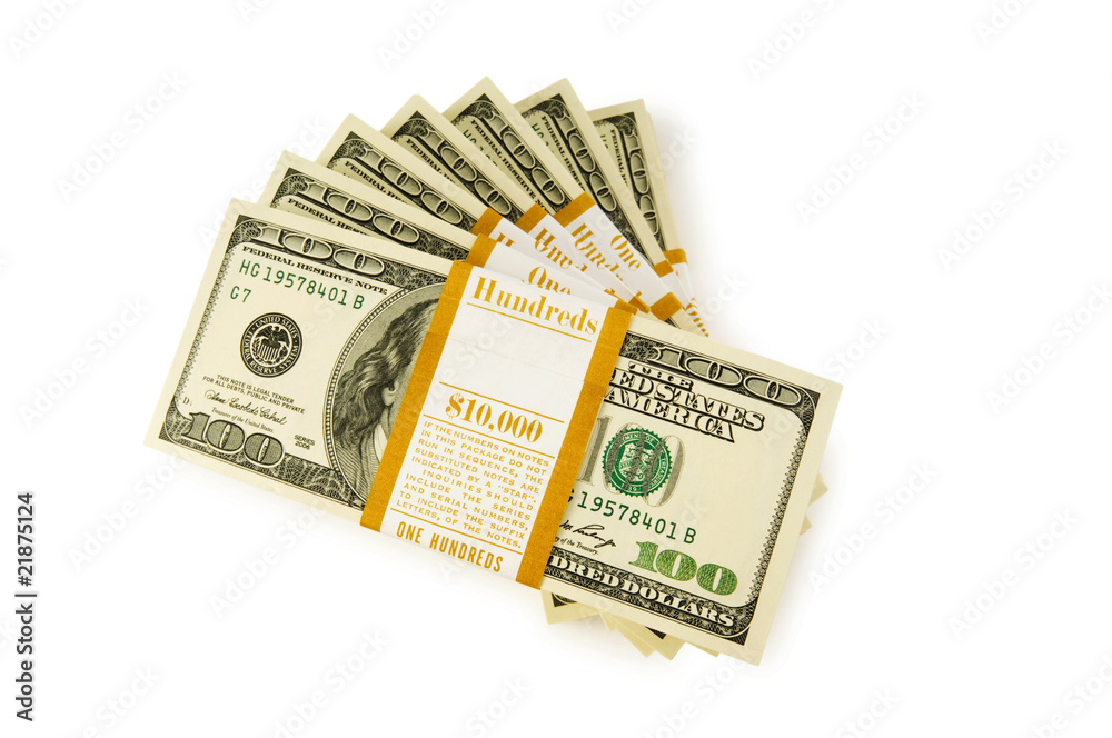 Stack of dollars isolated on the white Stack of dollars isolated on the white