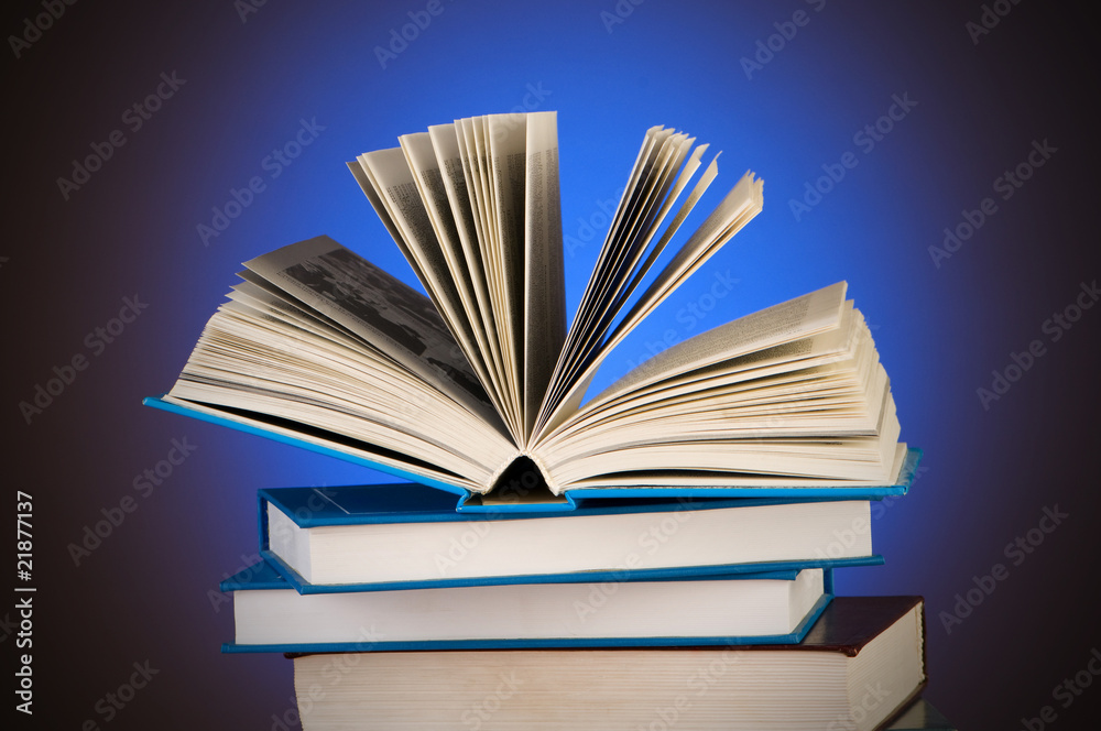 Stack of books against gradient background Stack of books against gradient background
