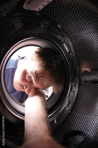young man in wash machine
