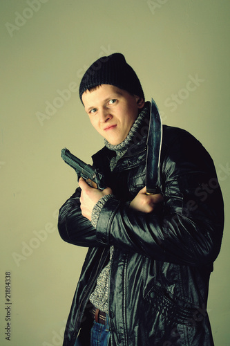 gangman with knife and gun photo