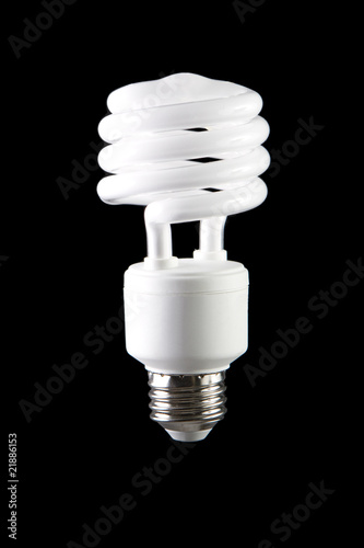 Energy saving lightbulb on black background