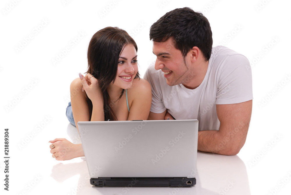 a beautiful young couple posing in studio a beautiful young couple posing in studio